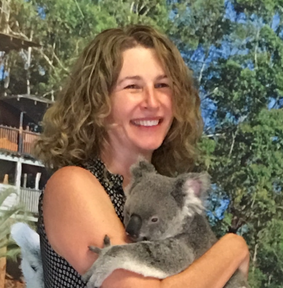 Dr. Nichole Fairbrother holding a koala bear