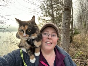 A photo of Heather McCain and their cat, Talula Belle