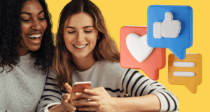 A photo of two people looking at content on a smartphone.